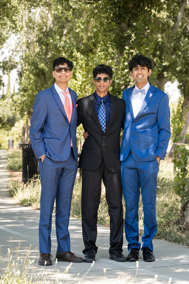 Formal three-guy prom group portrait in suits