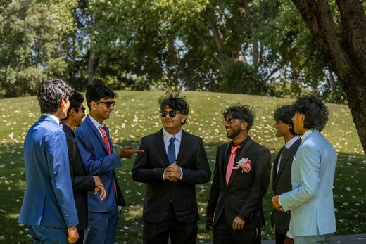 Candid group circle prom moment