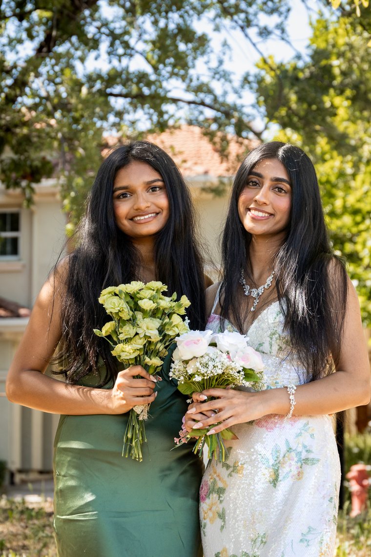Girls duo prom portrait with bouquets