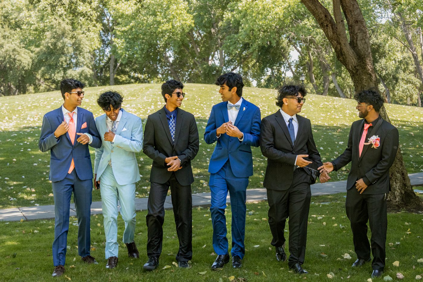 Candid group walking portrait during prom shoot